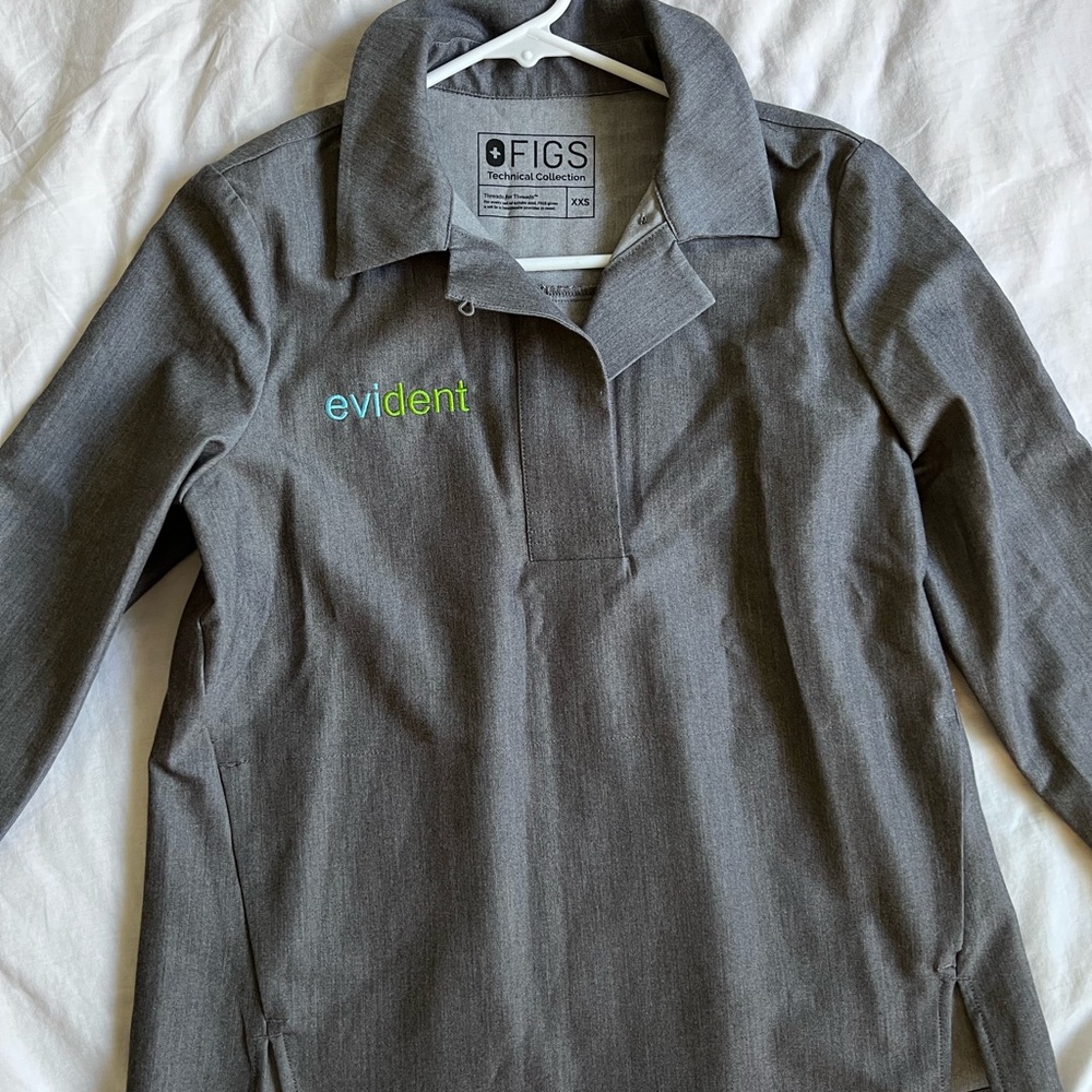 Figs scrub top in the color Graphite. Size XXS.